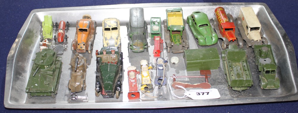 A group of assorted tinplate and diecast cars including Britains, Dinky and Tootsie